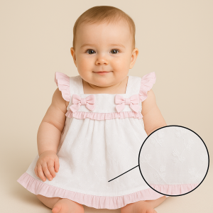 White and pink newborn baby girl frock with bows and ruffle detailing, for ages 0–6 months